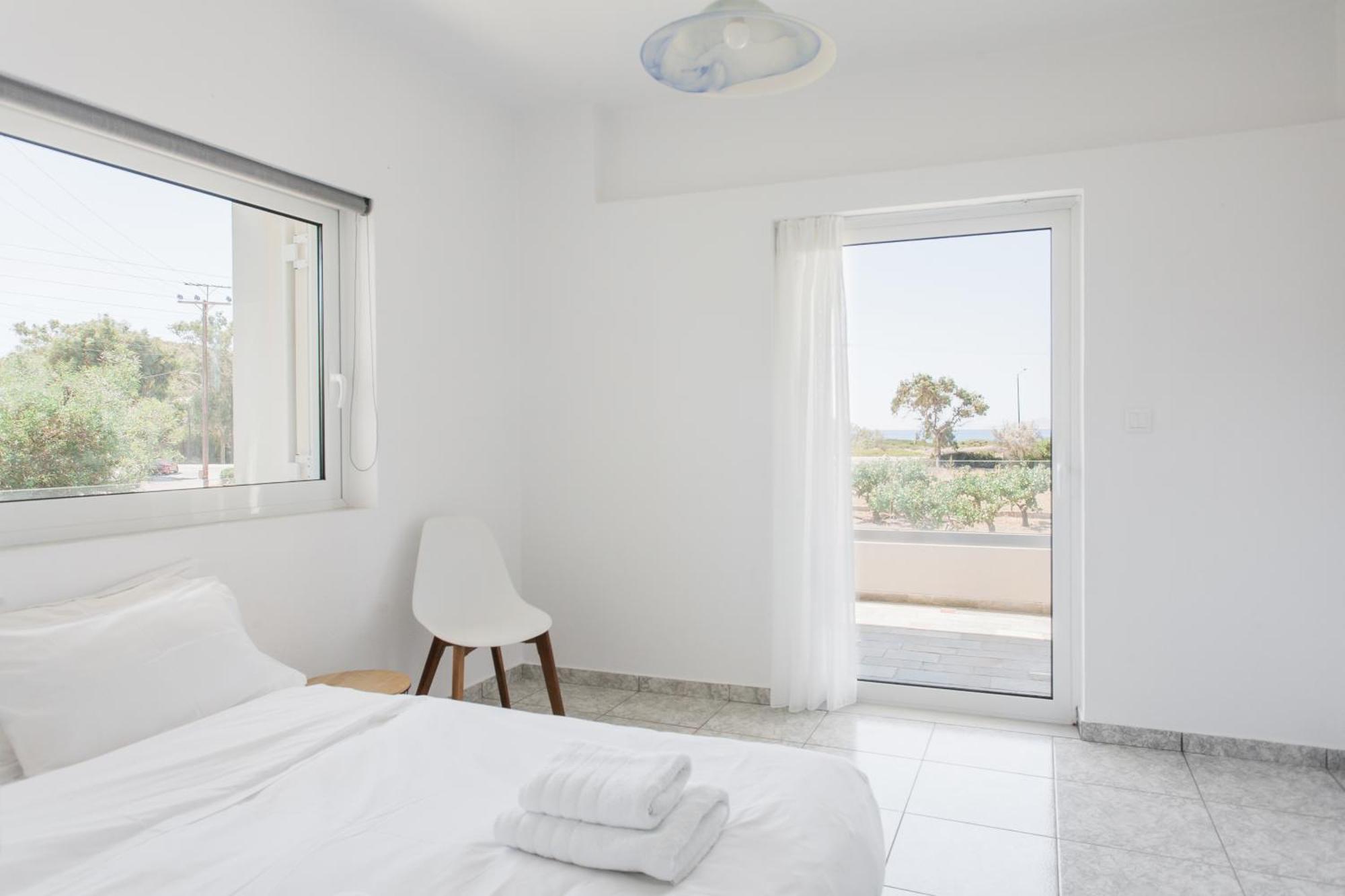 Legrena Beach House Kaap Soenion Kamer foto