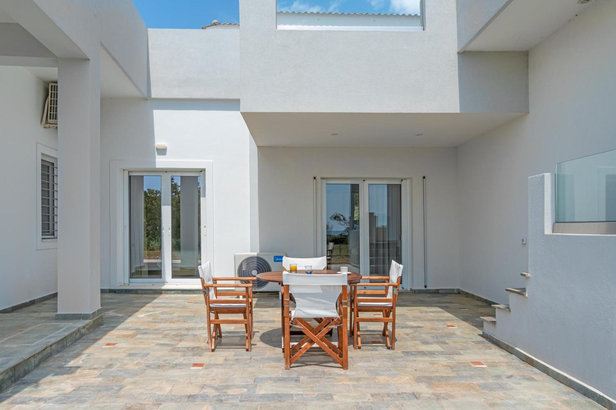 Legrena Beach House Kaap Soenion Kamer foto