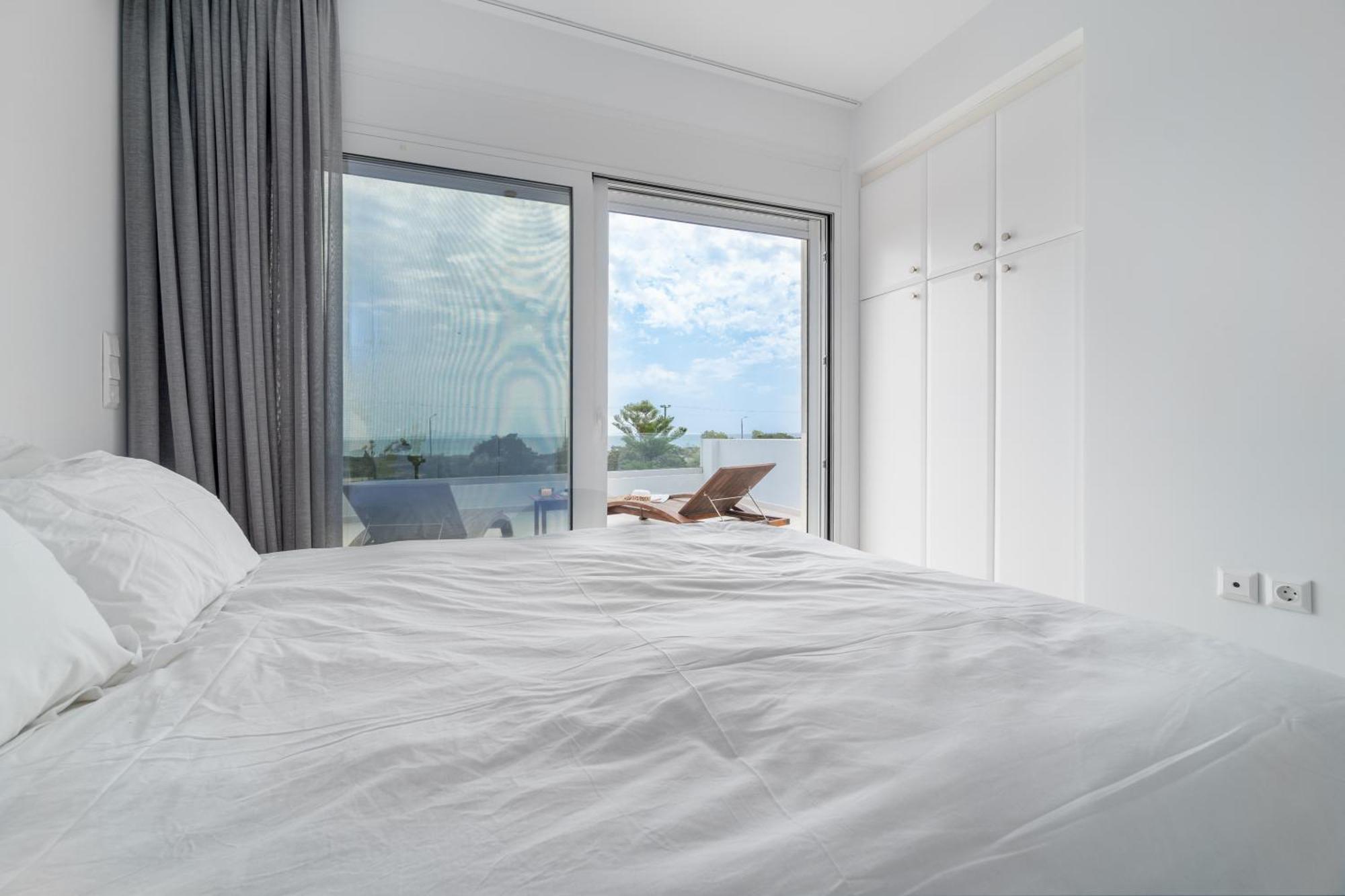 Legrena Beach House Kaap Soenion Kamer foto