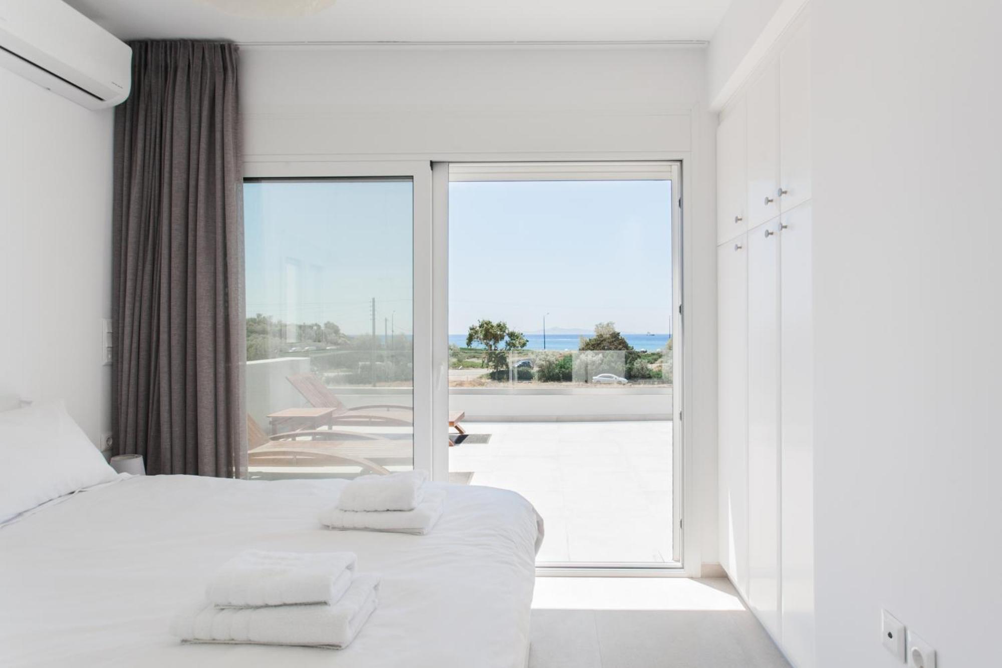 Legrena Beach House Kaap Soenion Kamer foto