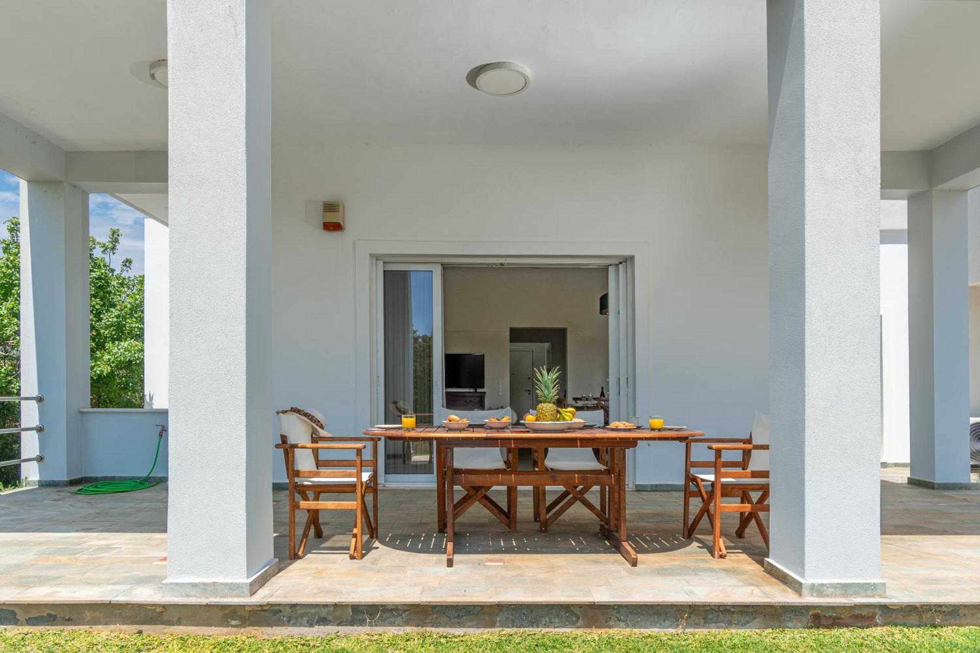 Legrena Beach House Kaap Soenion Kamer foto