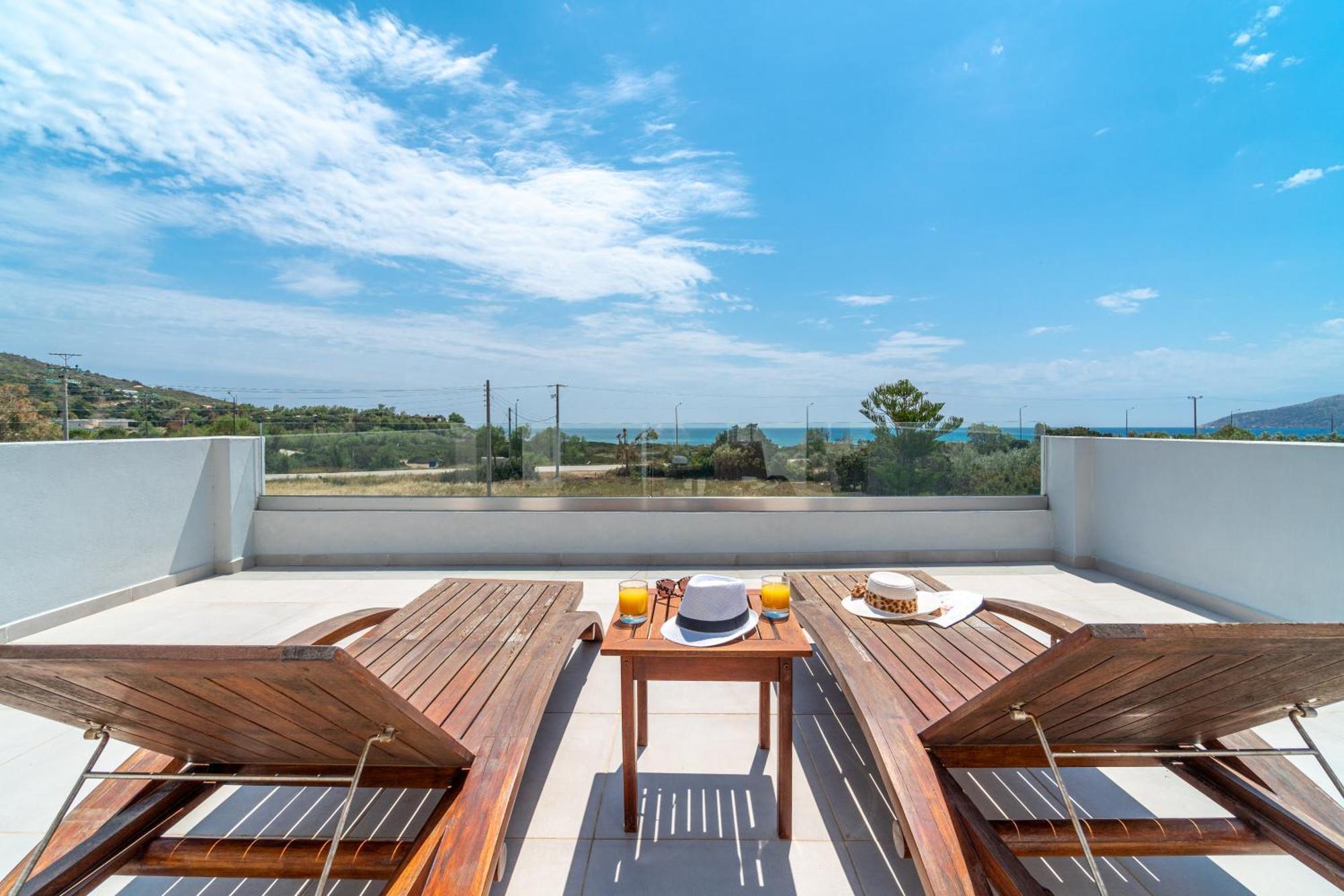 Legrena Beach House Kaap Soenion Kamer foto