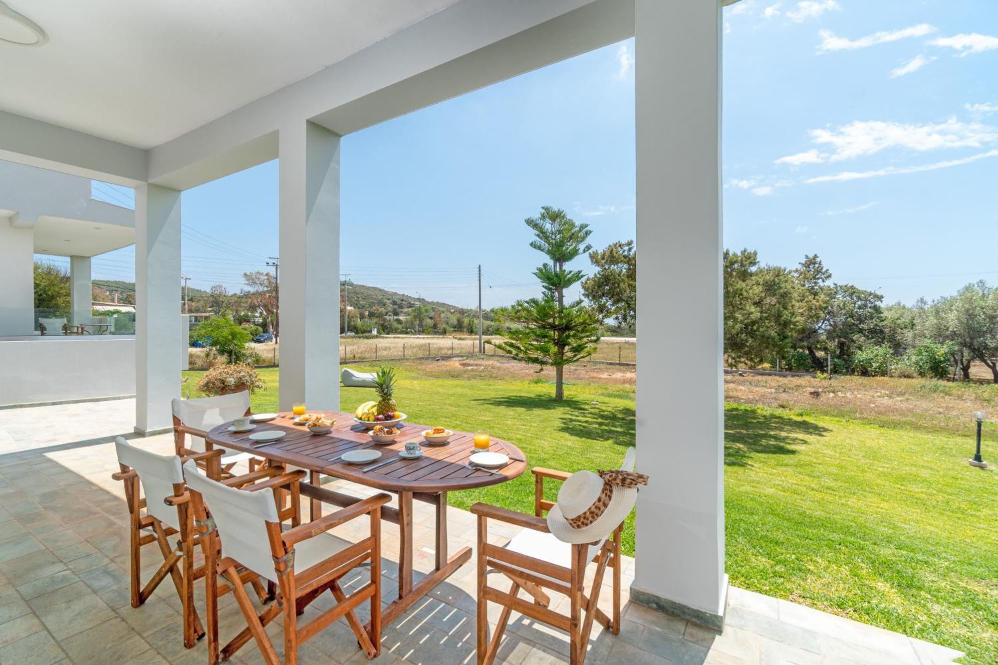 Legrena Beach House Kaap Soenion Kamer foto